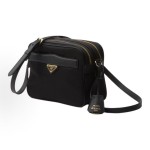 PRADA women\'s black crossbody single-shoulder bag with an enamel metal triangular logo on the front